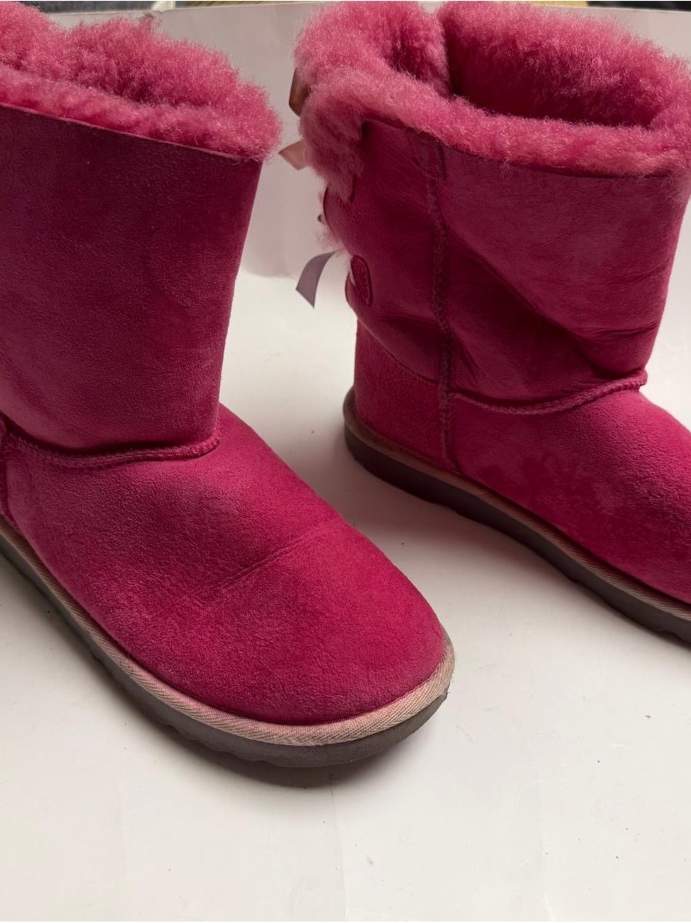 UGG Kids Fuchsia Suede Shearling Boots. They are a bit dirty on the back.